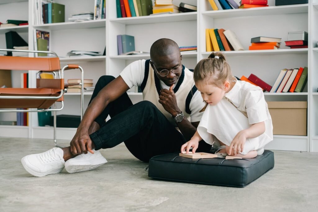 a man teaching a child