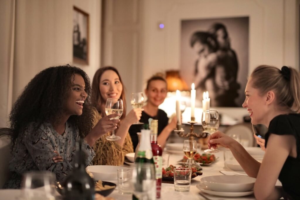women holding wine glasses
