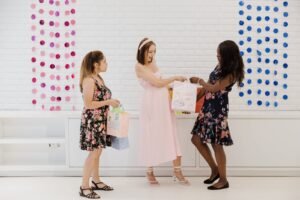 a pregnant woman receiving gifts